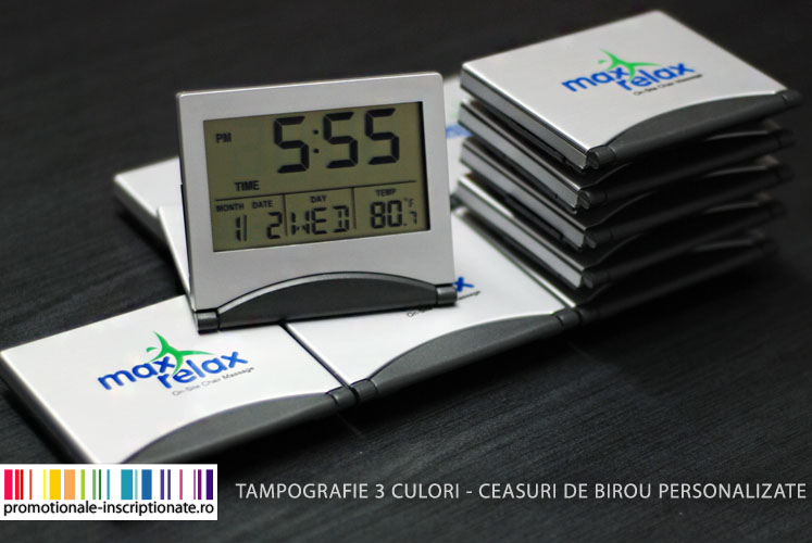 Ceasuri de birou personalizate prin tampografie la 3 culori pe suport metalic